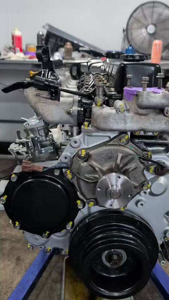 Rebuilt Nissan TD42 diesel engine on an engine stand